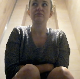 An Italian girl records herself taking a runny shit while sitting on a toilet in a public restroom. Poop action is shown from beneath her ass. Some product is shown in bowl and on her TP. Presented in 720P HD. 168MB, MP4 file. Over 8 minutes.